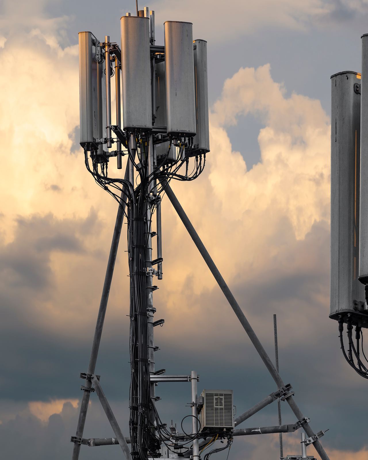 Rooftop antenna cluster at dusk